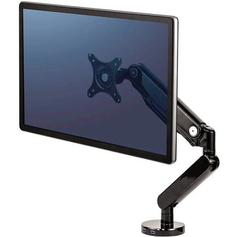 Side profile of the fully extended DeskStand Fellowes monitor arm showing angled joints, smooth movement range, and VESA mount holding a display.